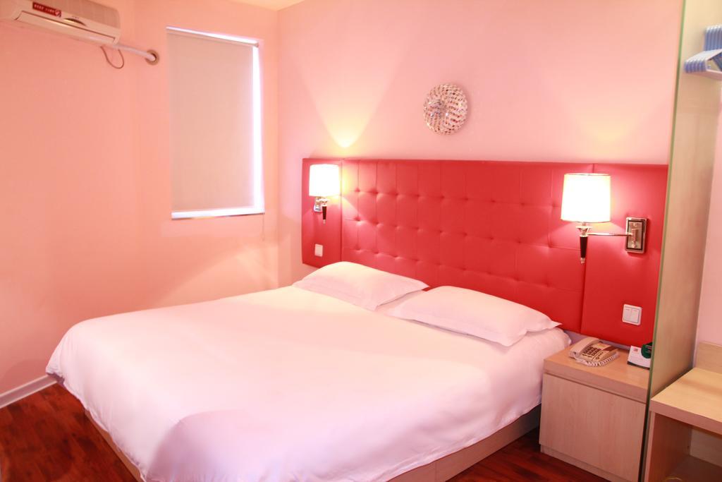Qingdao Renjia Bussiness Hotel Zimmer foto