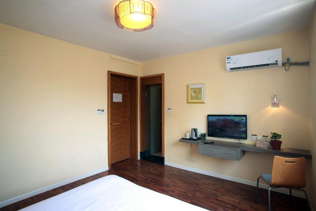 Qingdao Renjia Bussiness Hotel Exterior foto